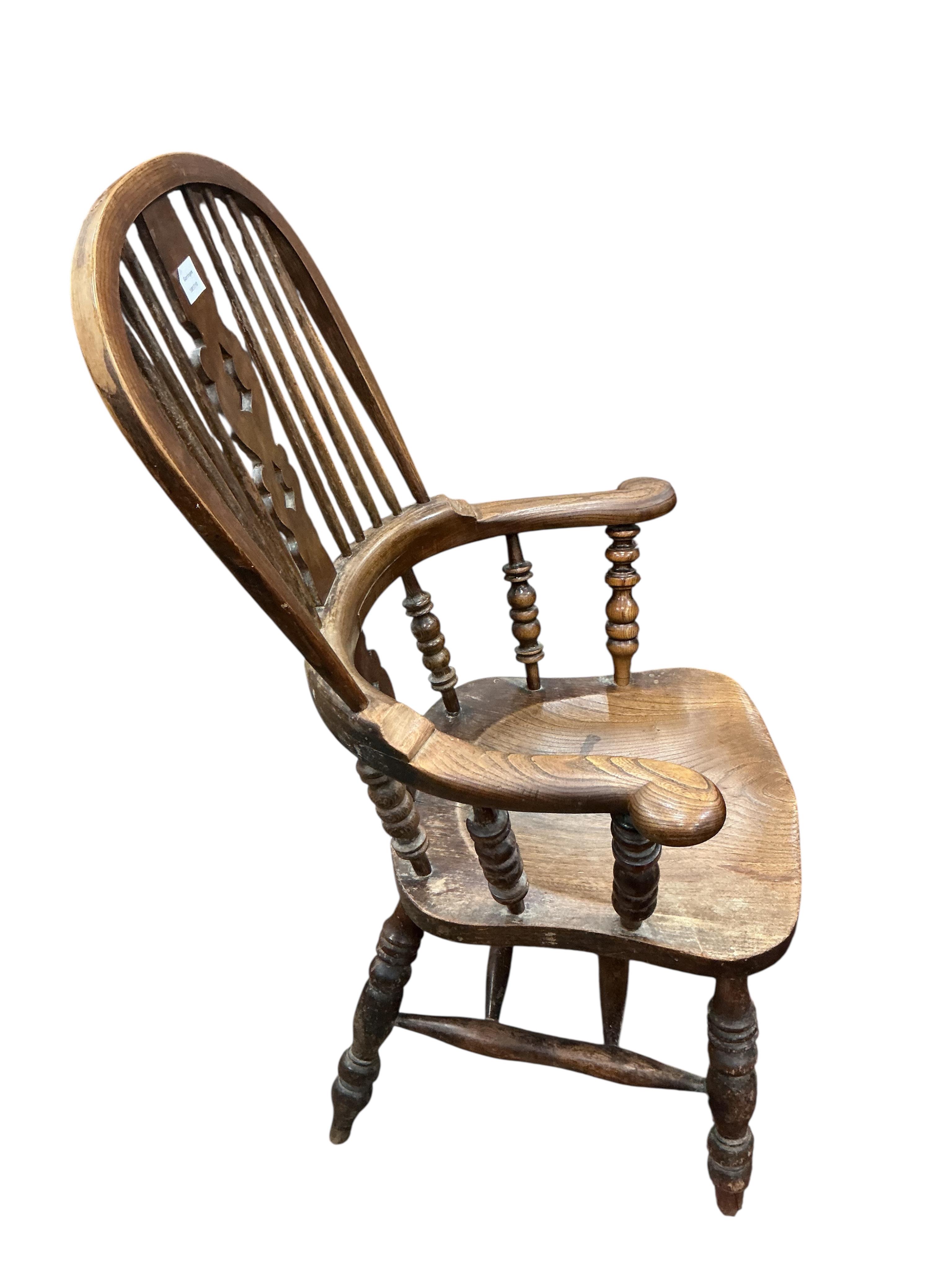 A Victorian ash and elm Yorkshire Windsor armchair, width 66cm, depth 47cm, height 116cm